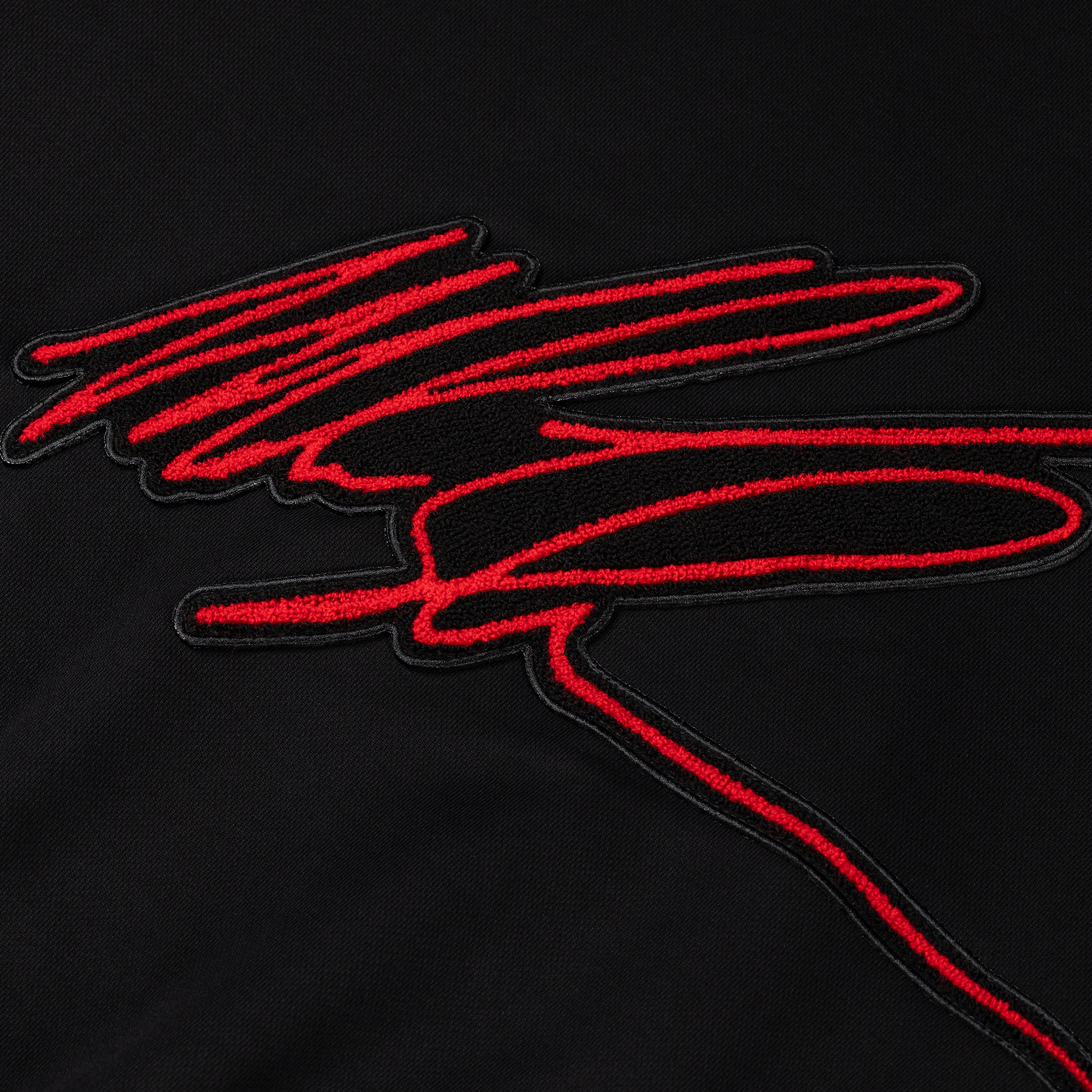 Mike Tyson Red embroidered design on a black background